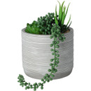 Green artificial succulents in a grey pot.