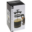 A cafetière with a black lid and handle inside its packaging.