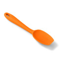 Orange silicone spatula spoon on a white background.