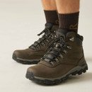 Front three-quarter view of brown hiking boots with lace-up fastening, metal eyelets, padded ankle collars and rugged grip soles.