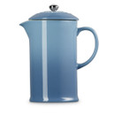A blue cafetière from the side