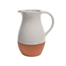 A grey and brown jug on a white background