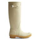 A biscuit coloured wellington boot from the side