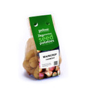 Bag of seed potatoes labelled "Jamieson Brothers," showing 2kg premium Scottish seed potatoes, maincrop variety called "Harmony," with a green label.