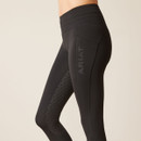 Close-up of a person wearing black athletic leggings with a high waistband. The leggings have a sleek design, featuring the brand logo "ARIAT" on the side.