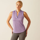 A woman wearing a purple sleeveless baselayer