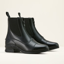 Pair of sleek black leather ankle boots with elastic side panels and pull tabs, displayed on a light background, conveying a modern, elegant style.