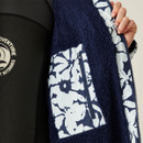 A close up view of the changing robe's zipped inner pocket.
