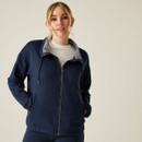 Model wearing a navy Regatta full zip jacket with drawcord funnel collar, striped lining and zip pockets.
