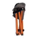 Folded camping stool with orange legs and a grey seat. The stool is compact, secured with a black strap, conveying portability and convenience.