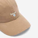 A close up of the stone cap with Barbour logo