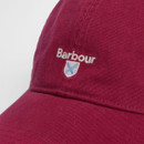 A close up of the Barbour logo on a red cap