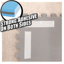 Double-sided adhesive on interlocking foam tiles with magnification showing layers.