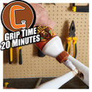 Hand applying glue from a tube to a broken wooden chair leg, with tools in background and text "GRIP TIME 20 MINUTES."