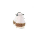 Side view of white leather lace-up trainer with tan heel tab and cork-effect midsole on a white background.