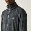 A close up view of the full zip design and the white Regatta logo on the chest.