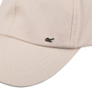 A close up view of the subtle 'R' Regatta branding above the cap's peak.