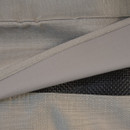 Close-up of layered fabrics: textured grey material, smooth grey edge, and a dark mesh layer underneath.