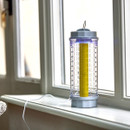 A view of a uv insect killer nect to a window