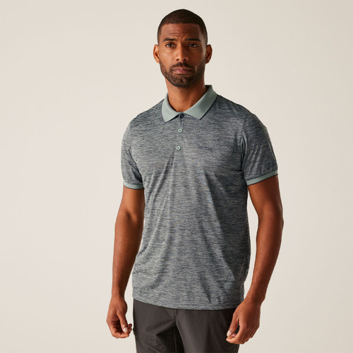 A man wearing a dark blue/grey polo shirt.