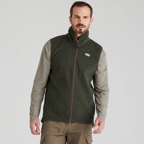 A front view of a man wearing a forest green Ridgeline fleece gilet