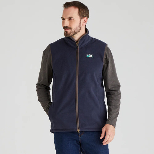 A front view of a man wearing a navy Ridgeline Fleece gilet