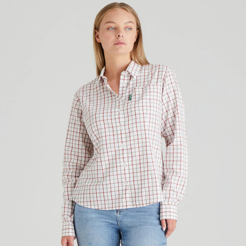 A front view of a woman wearing a russet coloured Ridgeline check shirt