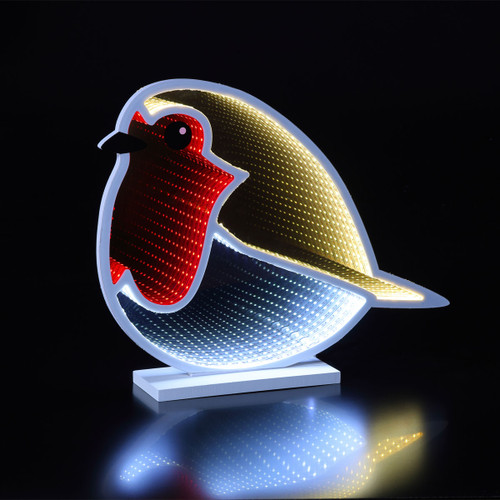 A robin shaped infinity light glowing against a black background.