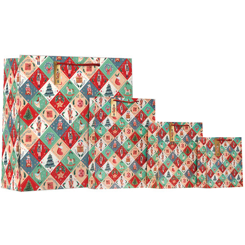 A collection of four nutcracker themed Christmas gift bags.