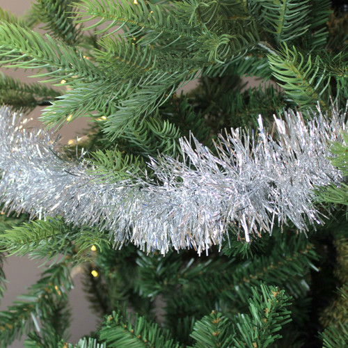 A view of silver tinsel on a Christmas tree