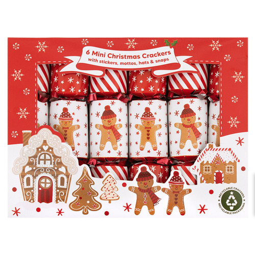 A festive box of six mini Christmas crackers featuring gingerbread designs, with stickers, hats, and jokes included.