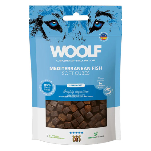A blue pet food package labelled "WOOLF" featuring Mediterranean fish soft cubes for dogs, highlighting nutritional benefits and digestibility.
