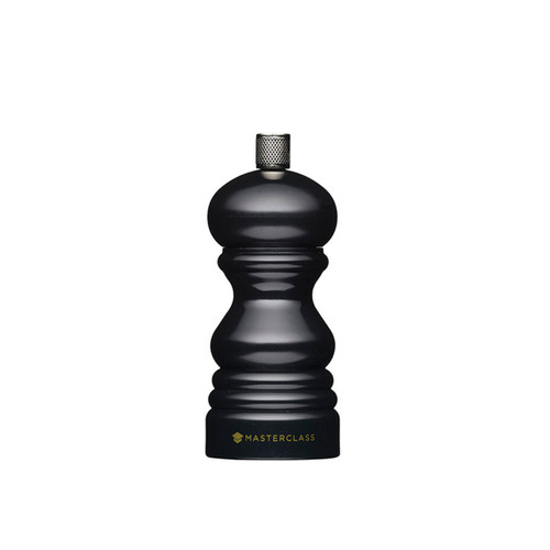 A small black salt or pepper mill