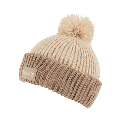 A side view of a light vanilla coloured bobble hat with a taupe coloured turn-up hem.
