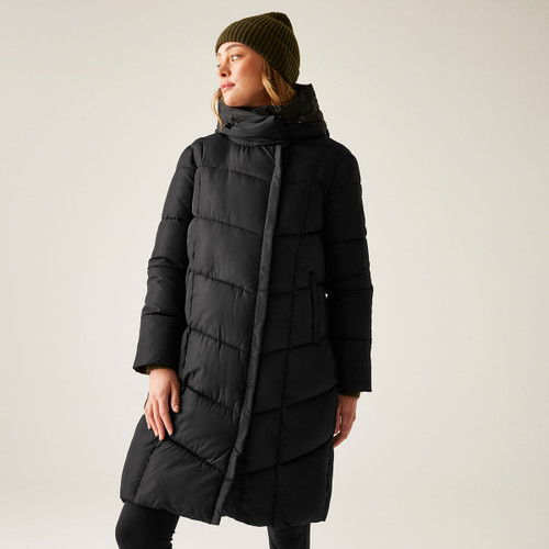 A woman wearing a black padded coat with a hood.