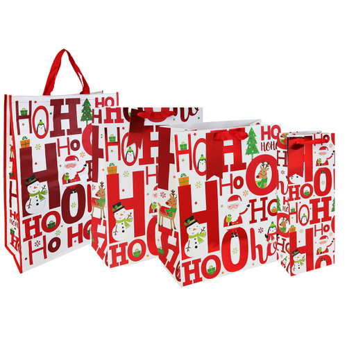 Four festive gift bags with a red "Ho Ho Ho" print, featuring snowmen, Santa, gifts, and trees, each with a red ribbon handle, evoke holiday cheer.