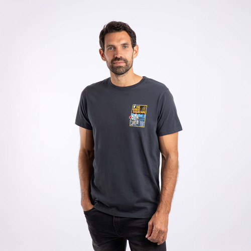 A man wearing a short-sleeved navy t-shirt with a small 'The Great Eggscape' print on the chest.
