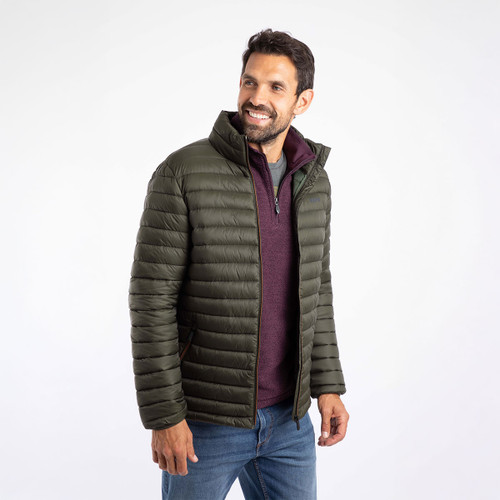 A man wearing an anthracite grey padded jacket.