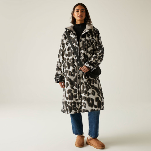 A full length view of a woman wearing a leopard print robe. A full length view of a woman wearing a leopard print robe.