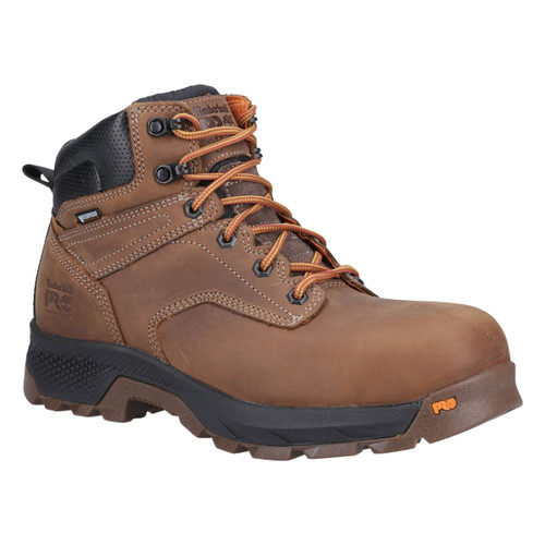 Brown leather Timberland PRO work boot with black padded collar, orange laces, reinforced toe, and slip-resistant rugged outsole, designed for durability and protection in tough work environments.