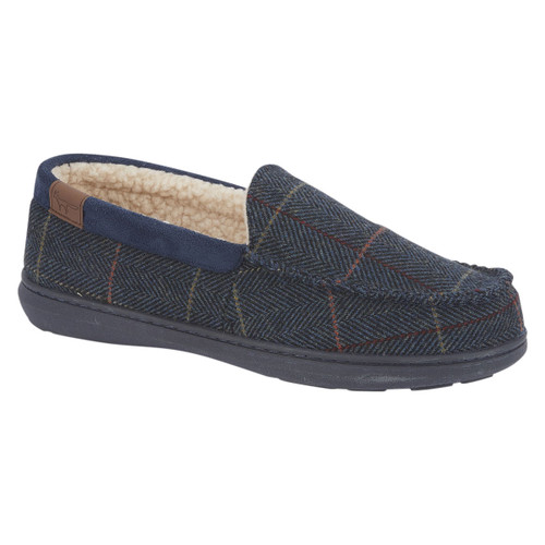 A men’s moccasin slipper with a classic navy herringbone check pattern, dark sole, and cream fleece lining for warmth and comfort.