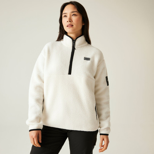Model wearing the Dare2b fleece from a slight angle, showing front details and the kangaroo pocket zips.