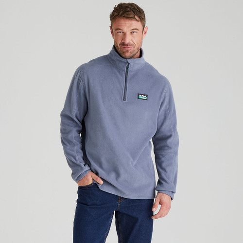 A front view of a blue quarter zip Ridgeline sweatshirt