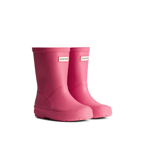 A pair of bright pink mid-height children's Hunter wellington boots.