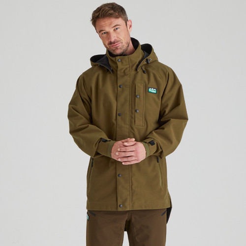 A front view of a man wearing a teak Ridgeline Classic Monsoon Jacket A front view of a man wearing a teak Ridgeline Classic Monsoon Jacket