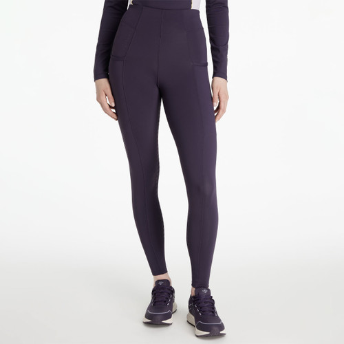 Front view of LeMieux Naomi pull-on breeches in juniper purple, featuring a high waistband and side pockets.