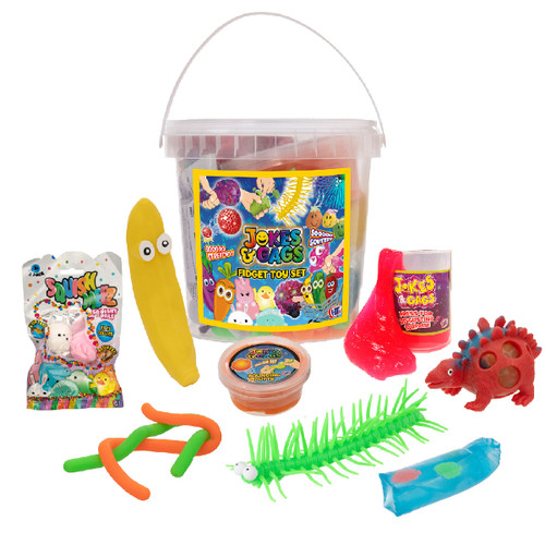 Jokes & Gags fidget toy set with assorted novelty toys including stretchy banana, squishy dinosaur, slime, putty, centipede toy and squishy balls, all stored in a clear bucket.