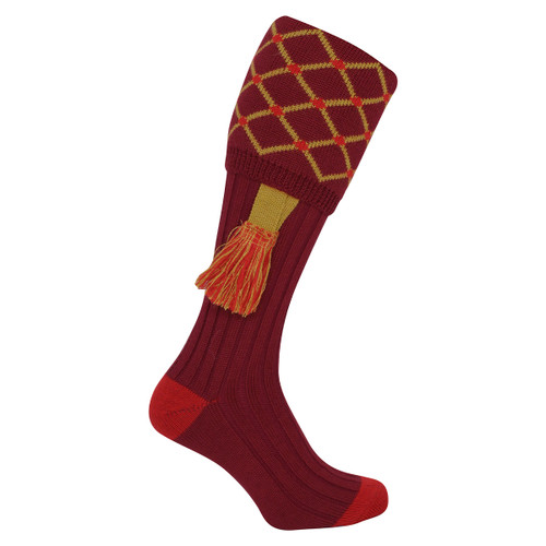A view of a burgundy red pair of shooting socks on a white background