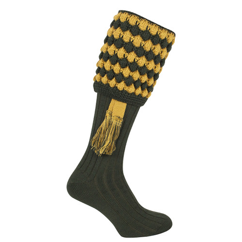 A view of a green pair of shooting socks on a white background