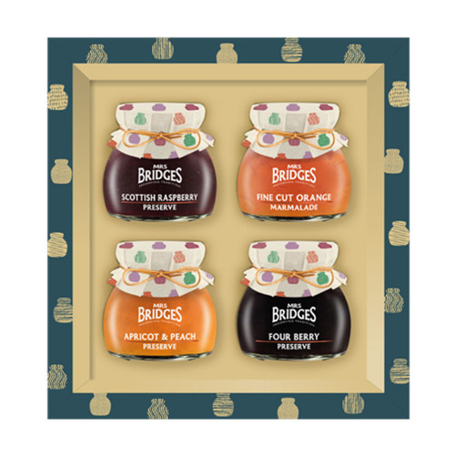 Mrs Bridges preserve gift set with four jars including Scottish Raspberry Preserve, Fine Cut Orange Marmalade, Apricot & Peach Preserve, and Four Berry Preserve, presented in a decorative box.